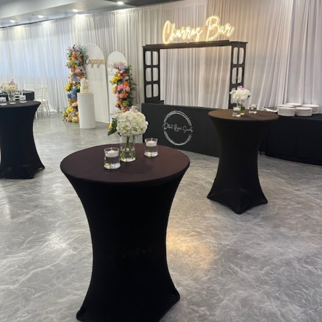 Cocktail tables and dessert bar at a Royal Palace event